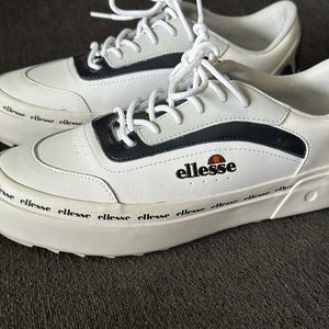 Ellesse alzina sneakers in white and navy USA size women 8, size 6.5 youth.